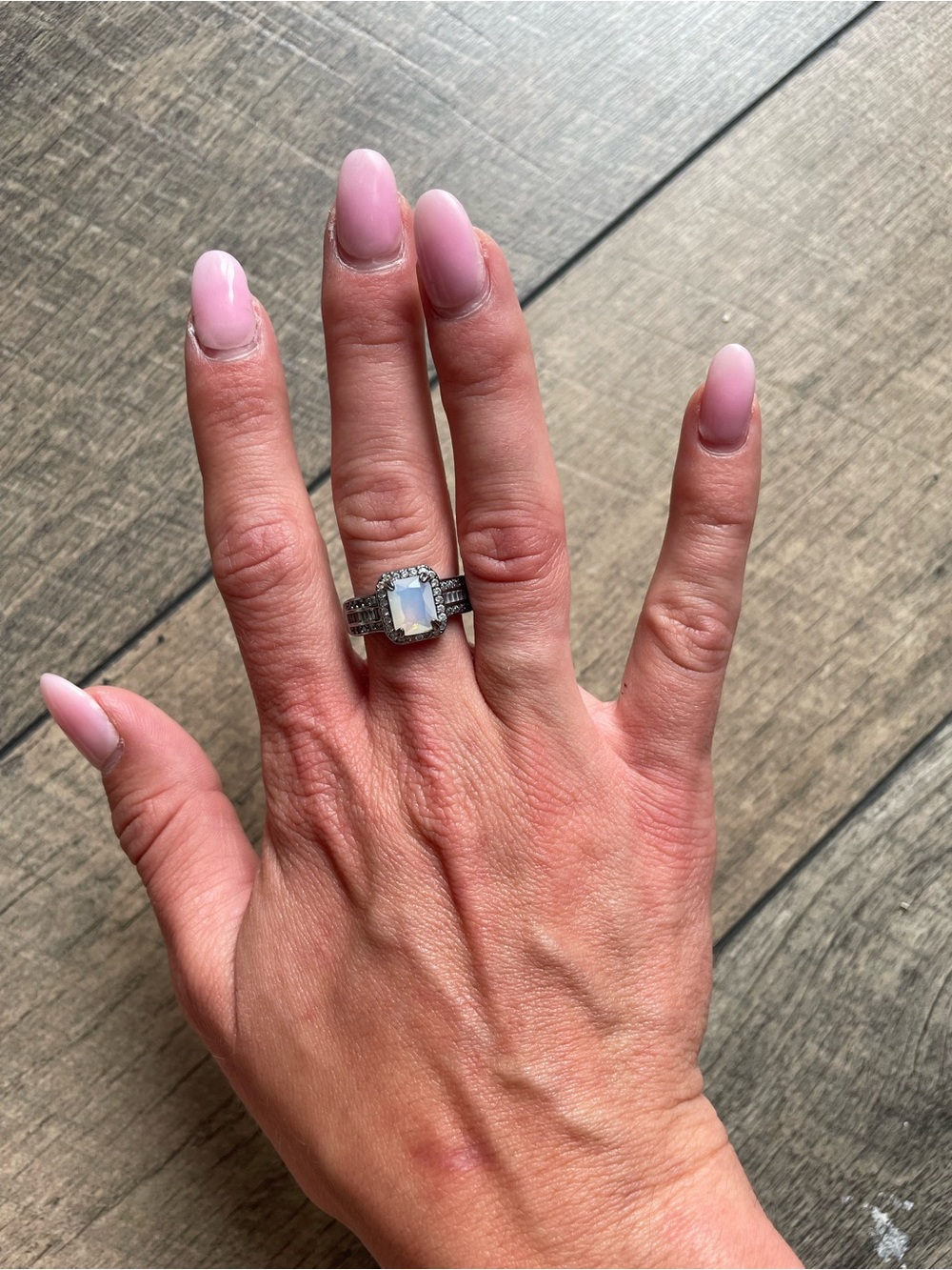 lab created white opal ring with Hematite plating